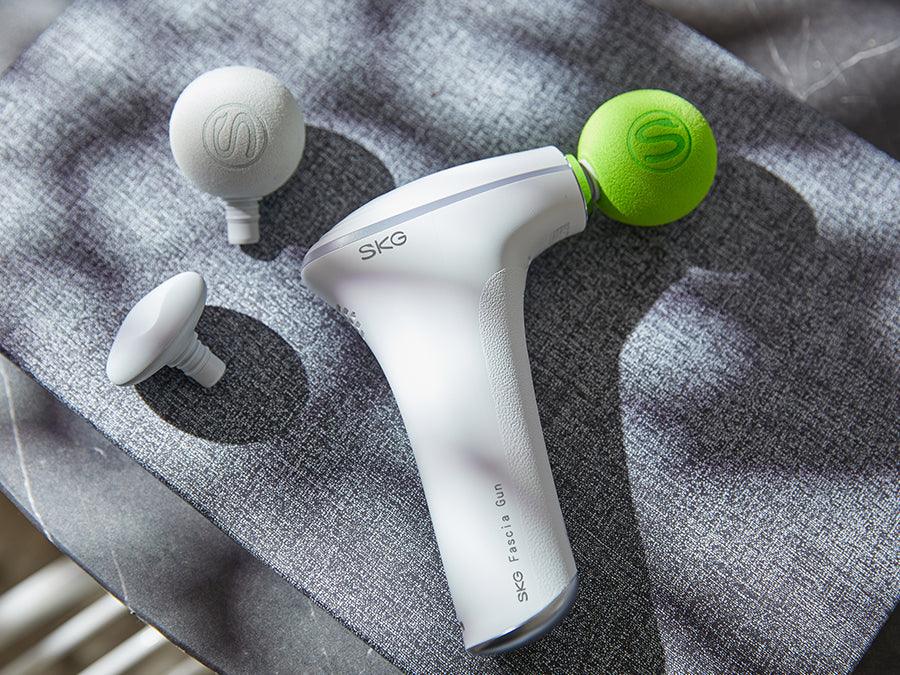 World’s First Massage Gun with a built-in Hot Compress - SKG